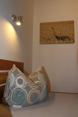 Ein Bett oder Betten in einem Zimmer der Unterkunft FeWo Kleine Hexe