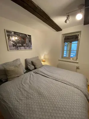 Ein Bett oder Betten in einem Zimmer der Unterkunft FachwerkLiebe