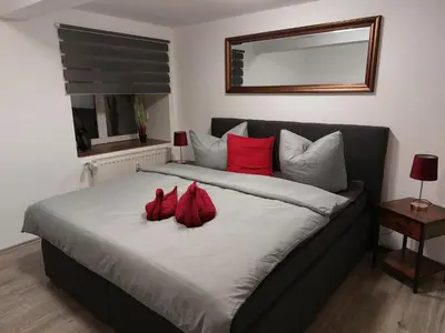 Ein Bett oder Betten in einem Zimmer der Unterkunft FeWo Gartenblick