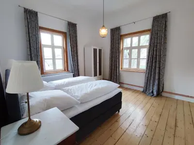 Ein Bett oder Betten in einem Zimmer der Unterkunft Ferienwohnung Goslar mit Parkblick am Harz