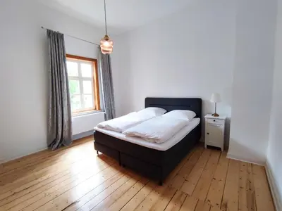 Ein Bett oder Betten in einem Zimmer der Unterkunft Ferienwohnung Goslar mit Parkblick am Harz