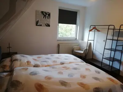Ein Bett oder Betten in einem Zimmer der Unterkunft Schöne Aussicht Wieda
