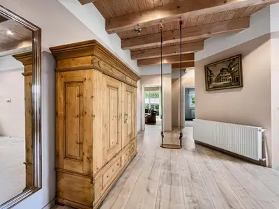 Ein Bett oder Betten in einem Zimmer der Unterkunft Kupferschmiede - Weber Grill - Feuerkorb - Terrasse - Indoorschaukel - Ideal für Familien