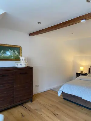 Ein Bett oder Betten in einem Zimmer der Unterkunft Ferienwohnungen Zum Neuhäusel