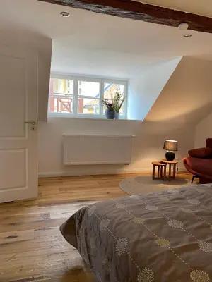 Ein Bett oder Betten in einem Zimmer der Unterkunft Ferienwohnungen Zum Neuhäusel