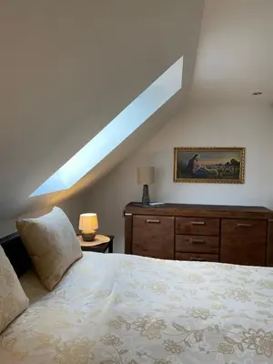 Ein Bett oder Betten in einem Zimmer der Unterkunft Ferienwohnungen Zum Neuhäusel
