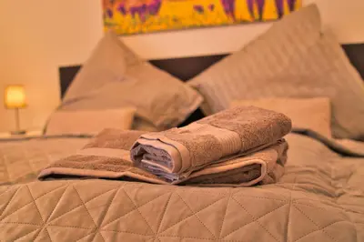 Ein Bett oder Betten in einem Zimmer der Unterkunft Heimat Goslar Apartments “Zur Kaiserpfalz“