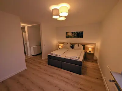 Ein Bett oder Betten in einem Zimmer der Unterkunft Rehberg
