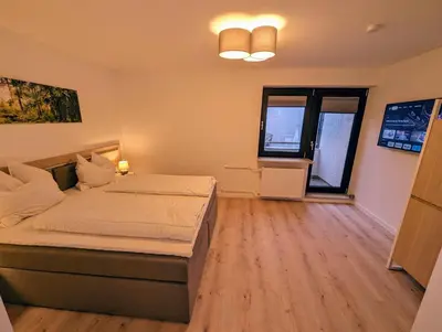Ein Bett oder Betten in einem Zimmer der Unterkunft Rehberg