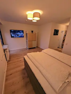 Ein Bett oder Betten in einem Zimmer der Unterkunft Rehberg