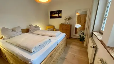 Ein Bett oder Betten in einem Zimmer der Unterkunft Kaiserstube 2