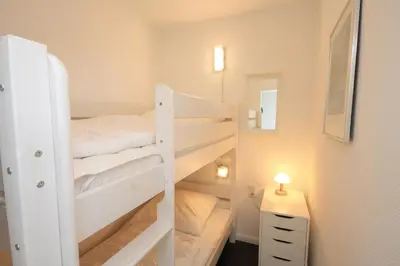 Ein Bett oder Betten in einem Zimmer der Unterkunft Ferienwohnung Traumausblick Hahnenklee