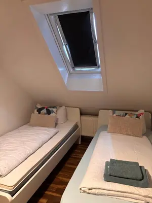 Ein Bett oder Betten in einem Zimmer der Unterkunft Ferienwohnung am Westerntor Jule inkl Parkplatz