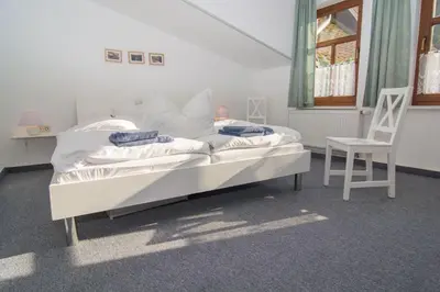 Ein Bett oder Betten in einem Zimmer der Unterkunft Ferienhaus Urlaub in Stolberg