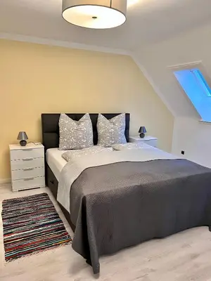 Ein Bett oder Betten in einem Zimmer der Unterkunft Fewo Goslar - Mitten im Herz Goslar