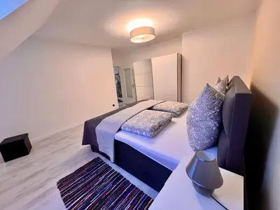 Ein Bett oder Betten in einem Zimmer der Unterkunft Fewo Goslar - Mitten im Herz Goslar
