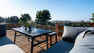 Ein Balkon oder eine Terrasse in der Unterkunft Ferienhaus Mountain View Six53 mit Sauna und Kamin in St. Andreasberg