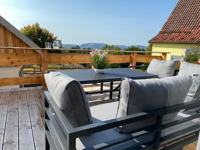 Ein Balkon oder eine Terrasse in der Unterkunft Ferienhaus Mountain View Six53 mit Sauna und Kamin in St. Andreasberg
