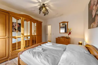 Ein Bett oder Betten in einem Zimmer der Unterkunft Ferienhaus Bavaria WR - Ferienwohnung Zefix