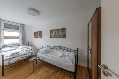 Ein Bett oder Betten in einem Zimmer der Unterkunft Ferienhaus Bavaria WR - Ferienwohnung Zefix