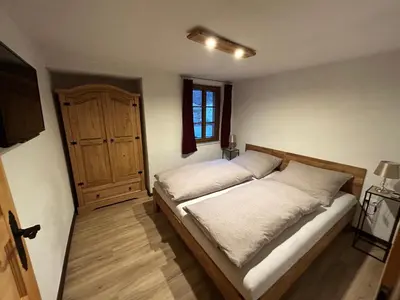 Ein Bett oder Betten in einem Zimmer der Unterkunft Insel 8