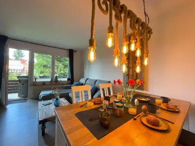 Ein Sitzbereich in der Unterkunft LIGHTQUARTIER Treefield -Sauna - Balkon- Waldnähe