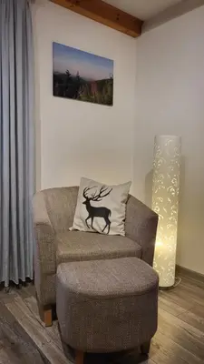 Ein Sitzbereich in der Unterkunft Ferienwohnung Bocksberg Hahnenklee