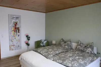 Ein Bett oder Betten in einem Zimmer der Unterkunft Ferienwohnung Lohrenz