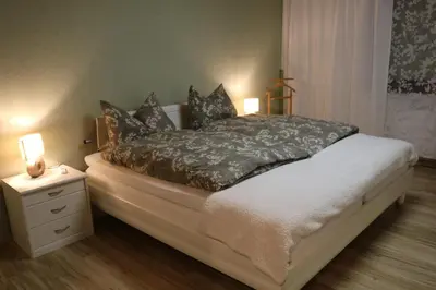 Ein Bett oder Betten in einem Zimmer der Unterkunft Ferienwohnung Lohrenz