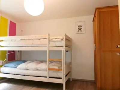 Ein Bett oder Betten in einem Zimmer der Unterkunft Ferienhaus 