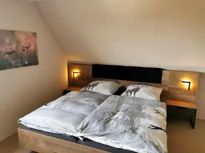 Ein Bett oder Betten in einem Zimmer der Unterkunft Ferienhaus 