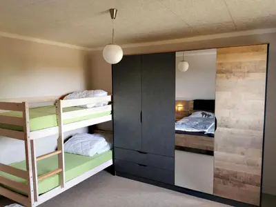 Ein Bett oder Betten in einem Zimmer der Unterkunft Ferienhaus 