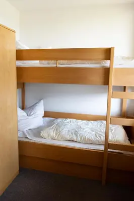 Ein Bett oder Betten in einem Zimmer der Unterkunft Morgenrot Lodge, im Harz, mit Schwimmbad und Sauna