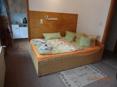 Ein Bett oder Betten in einem Zimmer der Unterkunft Ferienwohnungen im Fachwerkhaus