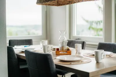Ein Sitzbereich in der Unterkunft Haus Sonneck - Apartmenthaus - Sonnenterrasse mit Grill - 1-8 Personen - ruhige Lage mit Blick über Braunlage