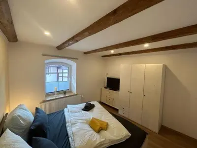 Ein Bett oder Betten in einem Zimmer der Unterkunft Ferienwohnung Knopp mit Infrarotsauna und Elektrokamin