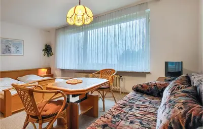 Ein Sitzbereich in der Unterkunft Nice Apartment In Goslar Ot Hahnenklee