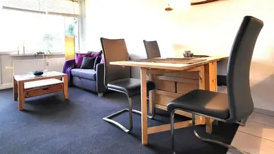 Ein Sitzbereich in der Unterkunft Ferienwohnung Sonnenberg Hahnenklee