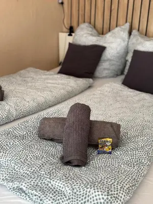 Ein Bett oder Betten in einem Zimmer der Unterkunft Duke-Fewo an der Radau -Bummelallee