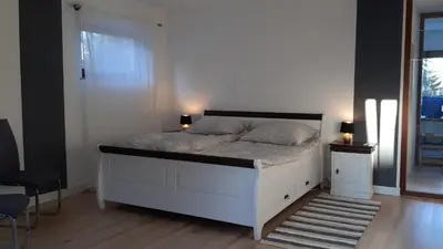 Ein Bett oder Betten in einem Zimmer der Unterkunft Zimmer mit Aussicht