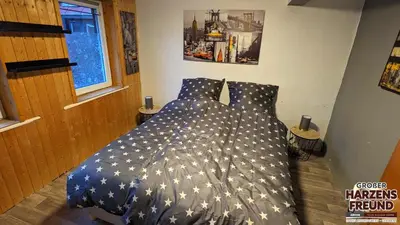 Ein Bett oder Betten in einem Zimmer der Unterkunft Arode Ferienhaus Harzensfreund