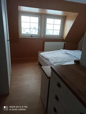Ein Bett oder Betten in einem Zimmer der Unterkunft Ruhige, gemütliche Ferienwohnung in Zentrumsnähe