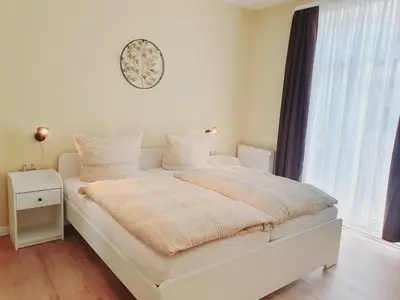 Ein Bett oder Betten in einem Zimmer der Unterkunft Harzhaus am Brunnen