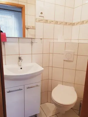 Ein Badezimmer in der Unterkunft Harzhaus am Brunnen