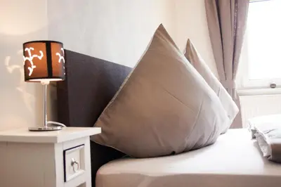 Ein Bett oder Betten in einem Zimmer der Unterkunft Grüne Insel