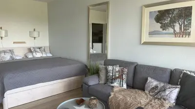 Ein Bett oder Betten in einem Zimmer der Unterkunft Ferienwohnung Seeblick Hahnenklee