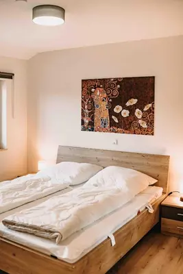 Ein Bett oder Betten in einem Zimmer der Unterkunft Sonneneck 2