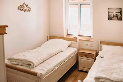 Ein Bett oder Betten in einem Zimmer der Unterkunft Sonneneck 1