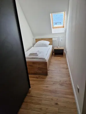 Ein Bett oder Betten in einem Zimmer der Unterkunft Ferienhaus Bavaria WR - Ferienwohnung Luja