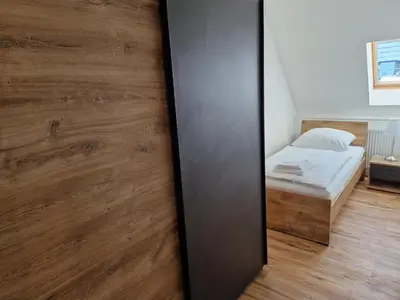 Ein Bett oder Betten in einem Zimmer der Unterkunft Ferienhaus Bavaria WR - Ferienwohnung Luja